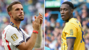 Jordan Henderson clapping and Danny Welbeck