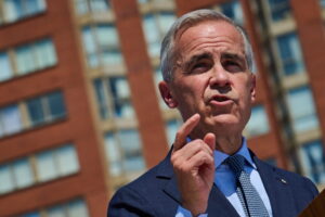 Prime Minister Mark Carney speaks at a housing announcement in Toronto, on Wednesday, Aug. 5, 2026. (Sammy Kogan/The