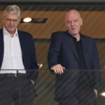 FIFA president Gianni Infantino, right, and Arsene Wenger, Chief Officer (FIFA) and former soccer coach arrive for the