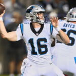 Carolina Panthers quarterback Haynes King (16) passes in the second half of the Pro Football Hall of Fame NFL preseason game