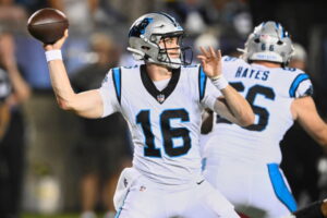 Carolina Panthers quarterback Haynes King (16) passes in the second half of the Pro Football Hall of Fame NFL preseason game
