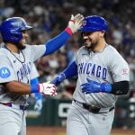 Chicago Cubs' Michael Conforto, right, celebrates his two-run home run against the Arizona Diamondbacks with Cubs' Pedro