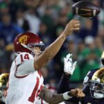 USC quarterback Jayden Maiava throws a pass under pressure against Notre Dame on Saturday in South Bend, Ind