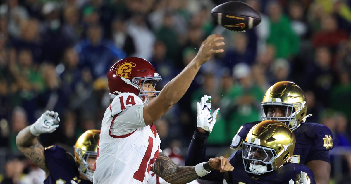 USC quarterback Jayden Maiava throws a pass under pressure against Notre Dame on Saturday in South Bend, Ind