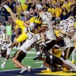 Michigan's wide receiver JJ Buchanan (6) makes the game-winning catch to win over Western Michigan with a last-second