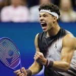 Ben Shelton, of the United States, celebrates after a point in the fifth set against Carlos Alcaraz, of Spain, during the