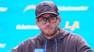 Jim Harbaugh Weighs Future of Chargers Offensive Coordinator Mike McDaniel