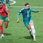 Northern Ireland’s Kess Elmore with Portugal's Diana Gomes