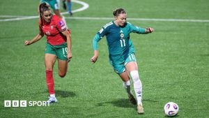Northern Ireland’s Kess Elmore with Portugal's Diana Gomes