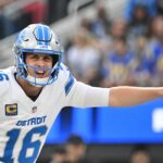 Detroit Lions quarterback Jared Goff (16) calls a play during the first half of an NFL football game against the Detroit