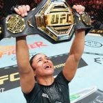 Natalia Silva lifts the UFC 332 flyweight belt