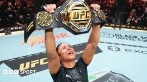 Natalia Silva lifts the UFC 332 flyweight belt