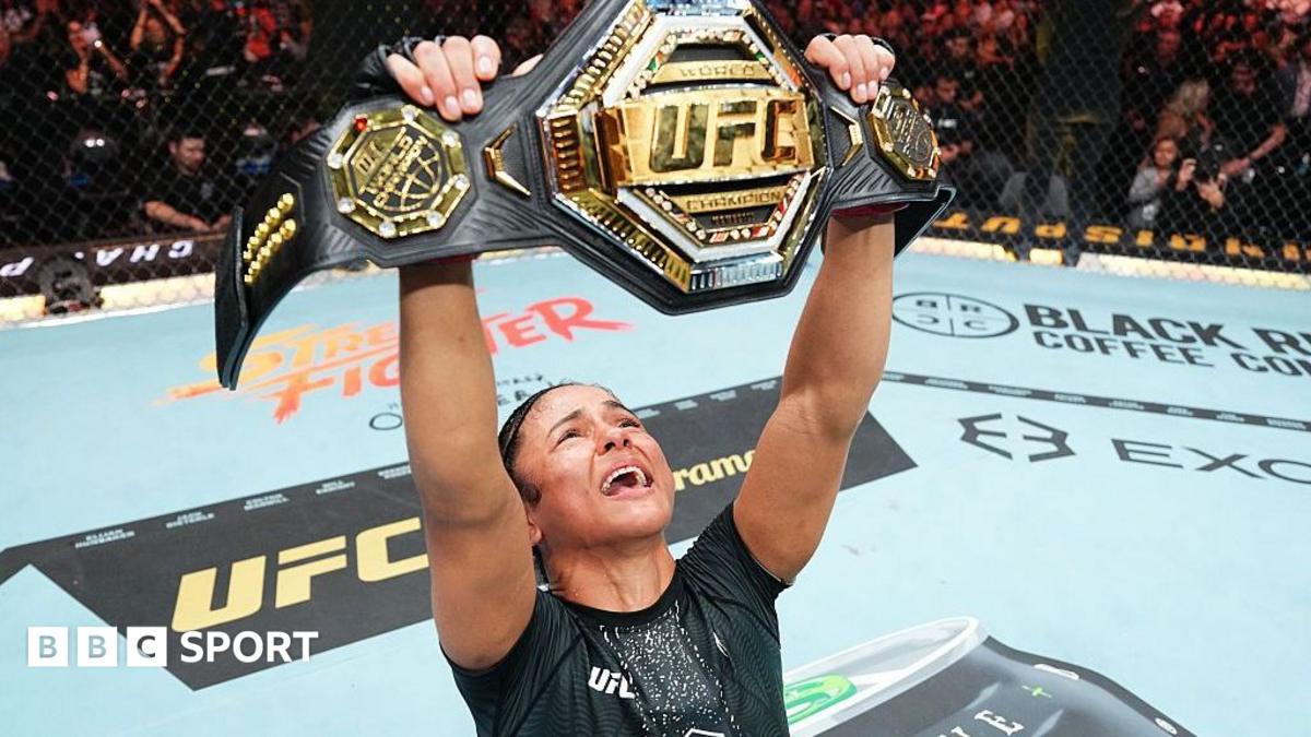 Natalia Silva lifts the UFC 332 flyweight belt