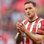 Billy Sharp applauds the Sheffield United fans after a game against Manchester City in 2023